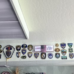 Sierra Cellars - First responder and military badges on the wall