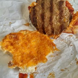 I call it the hockey puck burger.   Except a hockey puck has more flavour!