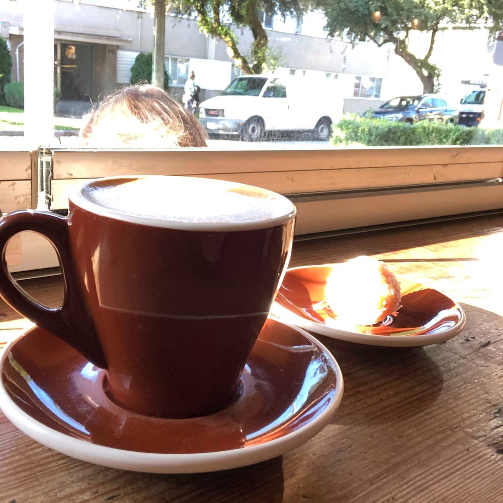 Greenhorn Cafe - Vanilla Latte and Coconut Lemon Bite - Cafes Near Me - Vancouver, British Columbia Greenhorn Cafe - Vanilla Latte and Coconut Lemon Bite - Cafes Near Me - Vancouver, British Columbia