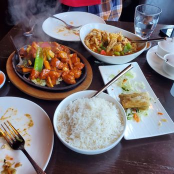 Red Hot Chilli Pepper - Honey Chicken is on the right which is my favorite with pineapple chunks. The other Chicken dish served with the very hot iron skillet..yum! - Chinese Near Me - San Carlos, California