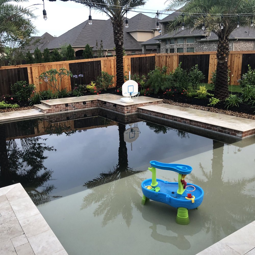 Admiral Pool Services - BEFORE: Pool that turned black from excessive rain storms. Landscaping was only 48 hours new! - Pool Cleaners Near Me - Friendswood, Texas Admiral Pool Services - BEFORE: Pool that turned black from excessive rain storms. Landscaping was only 48 hours new! - Pool Cleaners Near Me - Friendswood, Texas