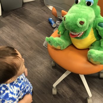Toothopia Dental - My son and Mr. Aligator ! The importance of healthy teeth. (My son's snack is on the floor lol ) - Orthodontists Near Me - Culver City, California