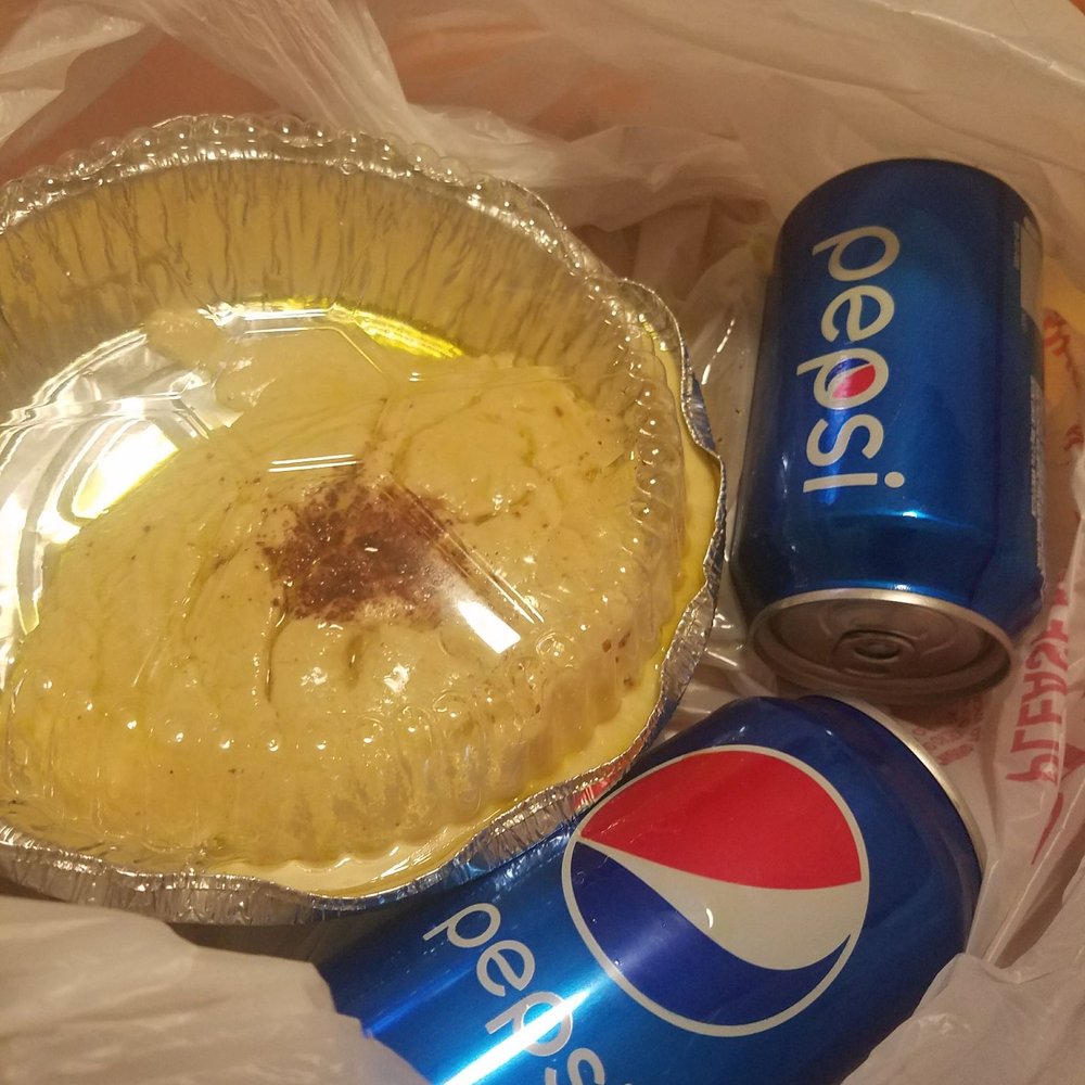 Kebab Platters - 2 cans of Pepsi with hummus & olive oil spilled over it -_- - Mediterranean Near Me - Clifton, New Jersey