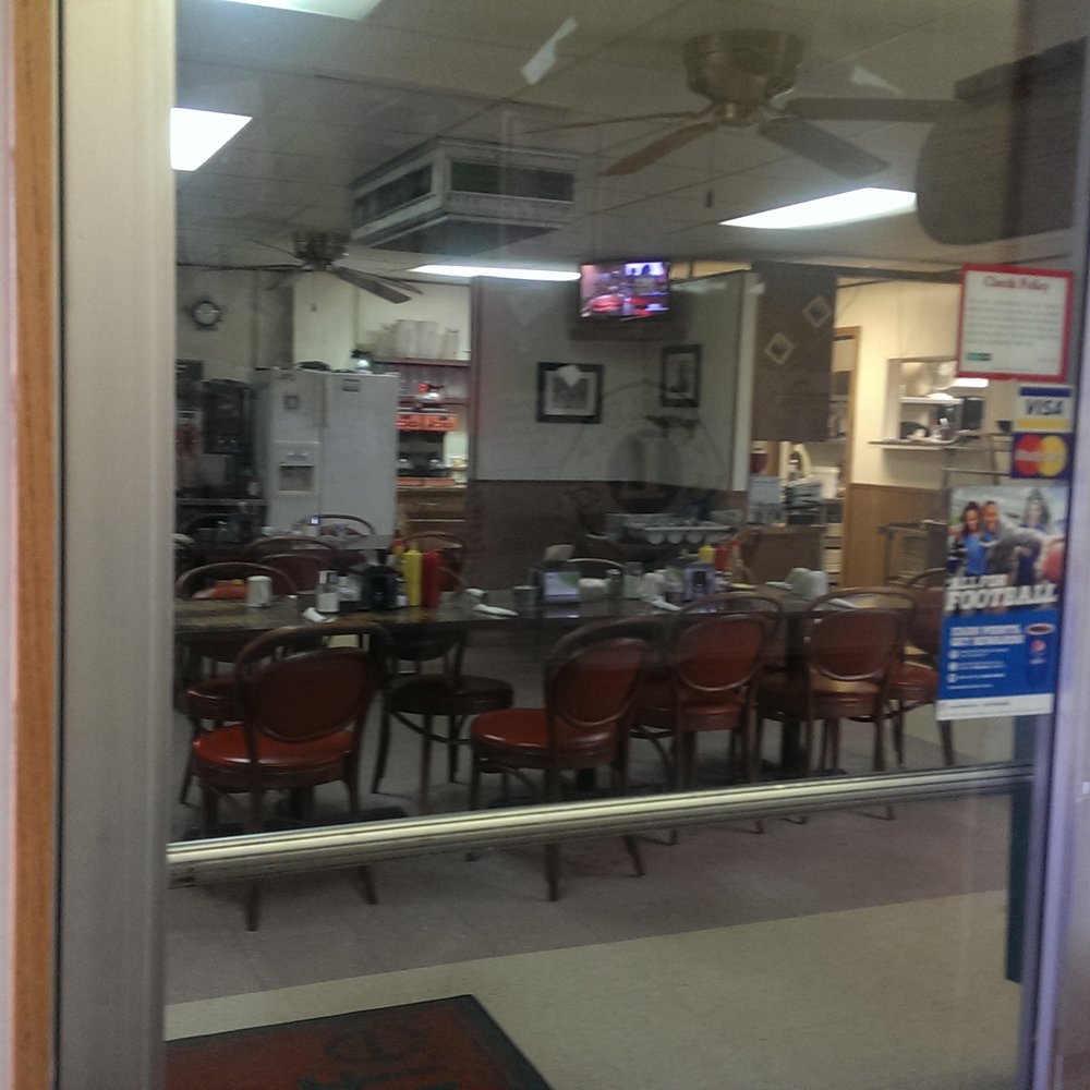 Joan's - a view of a restaurant through a glass door - Cafes Near Me - Stafford, Kansas Joan's - a view of a restaurant through a glass door - Cafes Near Me - Stafford, Kansas