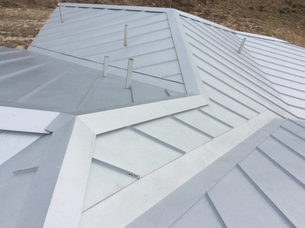 Slide of Candela Roofing