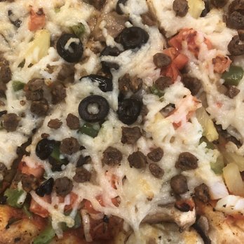 Sarpino's Pizzeria - Close up of vegan pizza. They use Daiya and Beyond products. - Pizza Near Me - Shawnee, Kansas Sarpino's Pizzeria - Close up of vegan pizza. They use Daiya and Beyond products. - Pizza Near Me - Shawnee, Kansas