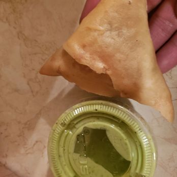 Star Kabob - Beef samosa beside the cilantro-mint chutney to show scale. - Indian Near Me - Toronto, Ontario Star Kabob - Beef samosa beside the cilantro-mint chutney to show scale. - Indian Near Me - Toronto, Ontario