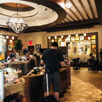 Modern Pantry - a man standing at a counter in a restaurant - Breakfast & Brunch Near Me - Lake Charles, Louisiana Modern Pantry - a man standing at a counter in a restaurant - Breakfast & Brunch Near Me - Lake Charles, Louisiana