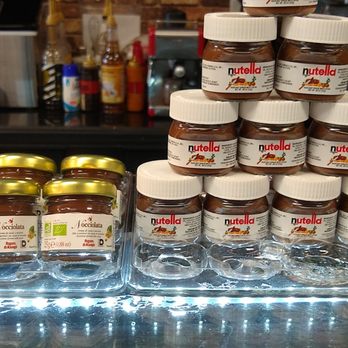 Dolce Venezia - a stack of jars of nut butter - Gelato Near Me - Miami, Florida Dolce Venezia - a stack of jars of nut butter - Gelato Near Me - Miami, Florida