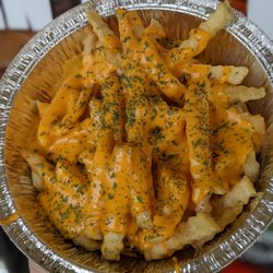 Lucino's Pizza - Cheese whiz fries!!