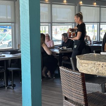 Dockside Waterfront Grill - Looking toward the covered patio area, July 2025 - Seafood Near Me - Venice, Florida