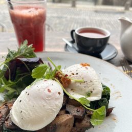 Portobello mushrooms with spinach & poached eggs on sourdough, red juice, tea Portobello mushrooms with spinach & poached eggs on sourdough, red juice, tea