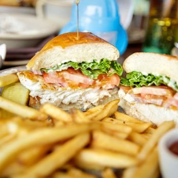 Pacific's Edge Restaurant - Fresh Catch Sandwich $27, sliced "seasonal catch, lettuce, tomato, citrus aoli, brioche bun" - Seafood Near Me - Carmel, California
