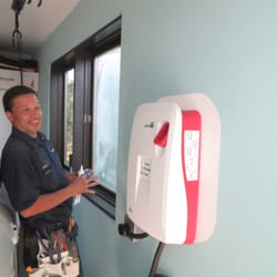West LA Electric - Electrician Rubottom installing an Electric vehicle charging station.