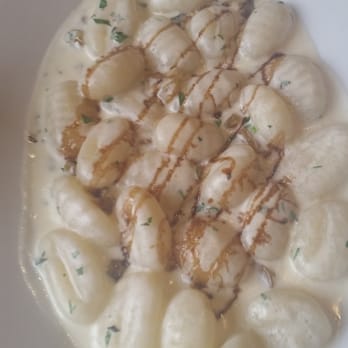 Five Loaves Cafe - Appetizer goat cheese gnocchi.  Consider adding shrimp or a protein and making it a meal.  It's fine. - Sandwiches Near Me - Summerville, South Carolina