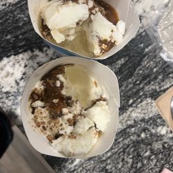 McDonald’s - Two "HERSHEY'S S'mores McFlurrys", except there's only"mix in" on the top and not mixed in.