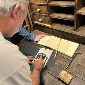 Jameson Distillery Bow St - My dad filling out his custom label - Museums Near Me - Dublin, D