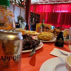 Mongolian beef, big egg rolls, lemon chicken, chowmein, and won ton soup. Sapporo and Tsingtao beer