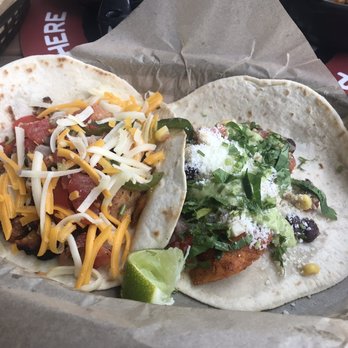 Torchy's Tacos - Chicken fajita taco, some kind of fish taco - Tacos Near Me - Fayetteville, Arkansas Torchy's Tacos - Chicken fajita taco, some kind of fish taco - Tacos Near Me - Fayetteville, Arkansas