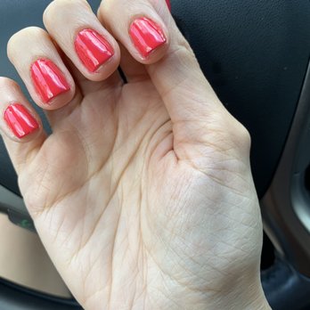 Tony's Nails & Spa - Final result.. after I asked her to clean the mess she made all over my skin. - Nail Salons Near Me - Atlanta, Georgia