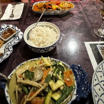 Chada Thai Cuisine - Further: Spicy red duck curry Closer: Green curry with rice and Tofu - Thai Near Me - Chico, California