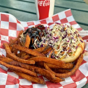Chicken in a Barrel BBQ - Hanalei - Open faced pulled pork sandwich with Cole slaw on top and sweet potato fries - Barbeque Near Me - Hanalei, Hawaii Chicken in a Barrel BBQ - Hanalei - Open faced pulled pork sandwich with Cole slaw on top and sweet potato fries - Barbeque Near Me - Hanalei, Hawaii