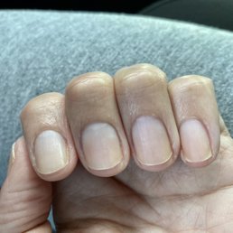 This is her idea of nicely filed nails This is her idea of nicely filed nails