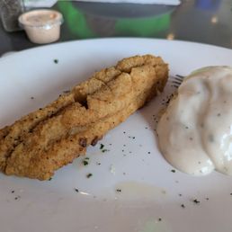 We split the Country Fried Catfish entree (2 filets, 2 sides + salad) We split the Country Fried Catfish entree (2 filets, 2 sides + salad)