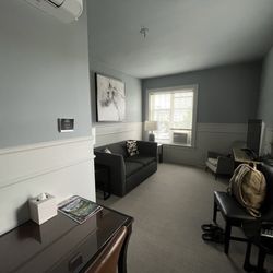 Executive room living area is a love seat, not a couch and there is no longer a second bed.