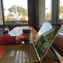 Counter along window is perfect height for laptop work