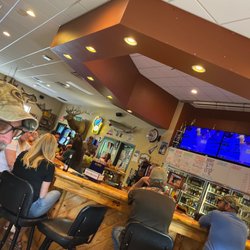 Woodeye's Bar & Grill - Woodeyes Bar area.