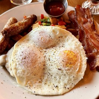 Homegrown Gastropub - Biscuits and Gravy with 3 OE easy eggs, sausage and bacon. - Gastropubs Near Me - Reno, Nevada