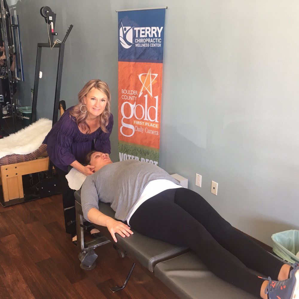 Terry Chiropractic Boulder - Dr. Natalie doing a prenatal adjustment - Chiropractors Near Me - Boulder, Colorado Terry Chiropractic Boulder - Dr. Natalie doing a prenatal adjustment - Chiropractors Near Me - Boulder, Colorado