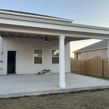 Texas Armour Construction - a covered patio with a fan - Patio Coverings Near Me Texas Armour Construction - a covered patio with a fan - Patio Coverings Near Me