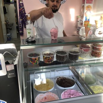 Almas Place - a man behind the counter of an ice cream shop - Ice Cream & Frozen Yogurt Near Me - Catalina, Arizona Almas Place - a man behind the counter of an ice cream shop - Ice Cream & Frozen Yogurt Near Me - Catalina, Arizona