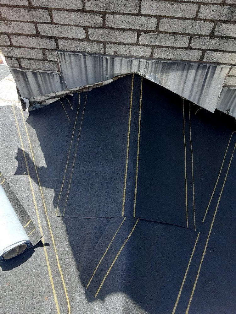 Slide of Leo's S & S Roofing