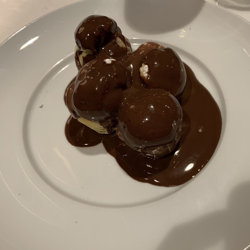 Le Crocodile Restaurant - Profiteroles with chocolate sauce - French Near Me - Vancouver, British Columbia Le Crocodile Restaurant - Profiteroles with chocolate sauce - French Near Me - Vancouver, British Columbia