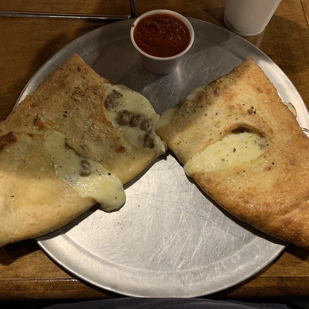 Slices Pizzeria - Sausage Calzone - Pizza Near Me - Thomaston, Georgia Slices Pizzeria - Sausage Calzone - Pizza Near Me - Thomaston, Georgia