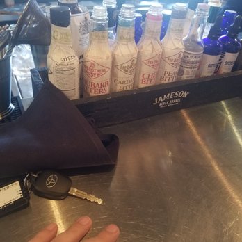 Pie 314 Everyday Eatery - Open bottles of bitters two hands distance away. - Pizza Near Me - Lewisville, Texas
