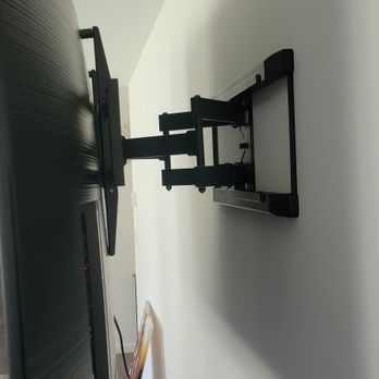 Brown Assembling & TV Mounting Services - Curve tv mount side view - TV Mounting Near Me Brown Assembling & TV Mounting Services - Curve tv mount side view - TV Mounting Near Me