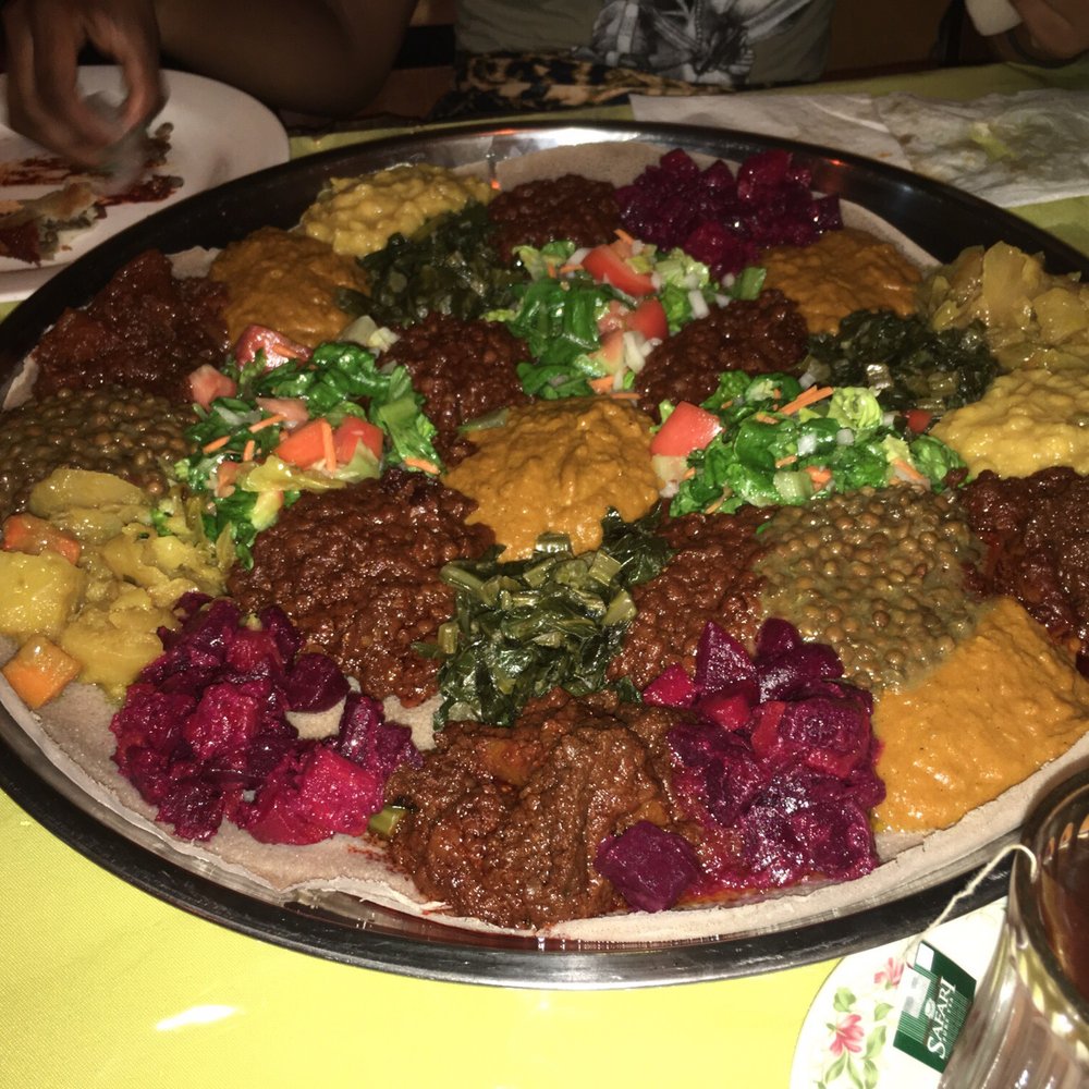 Tabor Ethiopian Restaurant - 3 9 choice veg entrees on one shared platter - Ethiopian Near Me - Baltimore, Maryland Tabor Ethiopian Restaurant - 3 9 choice veg entrees on one shared platter - Ethiopian Near Me - Baltimore, Maryland