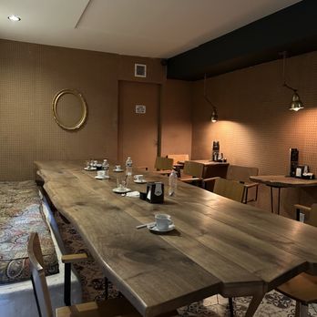 Prince Coffee House - a table and chairs in a room - Coffee & Tea Near Me - Bronx, New York Prince Coffee House - a table and chairs in a room - Coffee & Tea Near Me - Bronx, New York