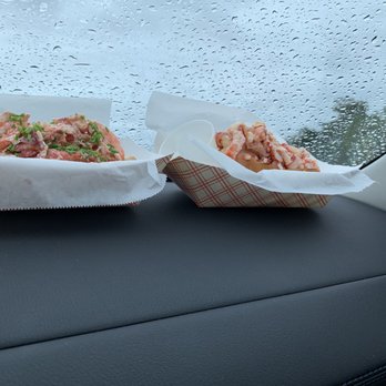 Bite Into Maine - Maine lobster roll on left and Connecticut lobster roll on right - Seafood Near Me - Cape Elizabeth, Maine Bite Into Maine - Maine lobster roll on left and Connecticut lobster roll on right - Seafood Near Me - Cape Elizabeth, Maine