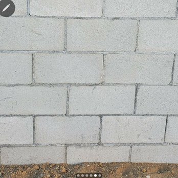 Mr Fix It - a brick wall being built - Painters Near Me