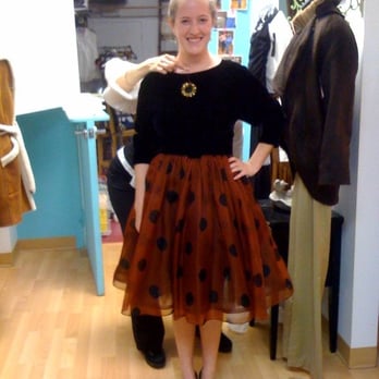 New To You - An employee was kind enough to take my picture in a dress I liked! Another employee is holding up a brooch that matched :) - Used, Vintage & Consignment Near Me - Mclean, Virginia New To You - An employee was kind enough to take my picture in a dress I liked! Another employee is holding up a brooch that matched :) - Used, Vintage & Consignment Near Me - Mclean, Virginia