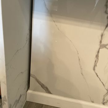 Cabinets To Go - Gaps where they were too lazy to remove trim to make it flush with vertical wall. - Cabinetry Near Me - Austin, Texas Cabinets To Go - Gaps where they were too lazy to remove trim to make it flush with vertical wall. - Cabinetry Near Me - Austin, Texas