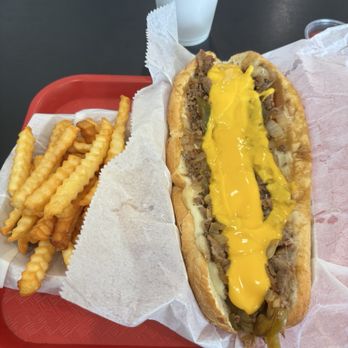 Philly Grill - With onion, pepper, provolone, and wiz, all this for $16... STEAL - Cheesesteaks Near Me - Lake Worth, Florida