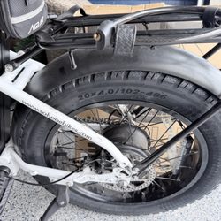 Look at rear tire so close and cannot spin rubbing