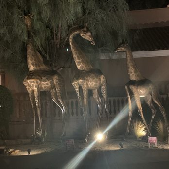 Kabob House - Giraffe statues across from restaurant. - Afghan Near Me - Danville, California