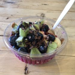 Living Foods - Dragonfruit bowl with blueberry, banana, kiwi, almond butter, cacao nibs and honey.